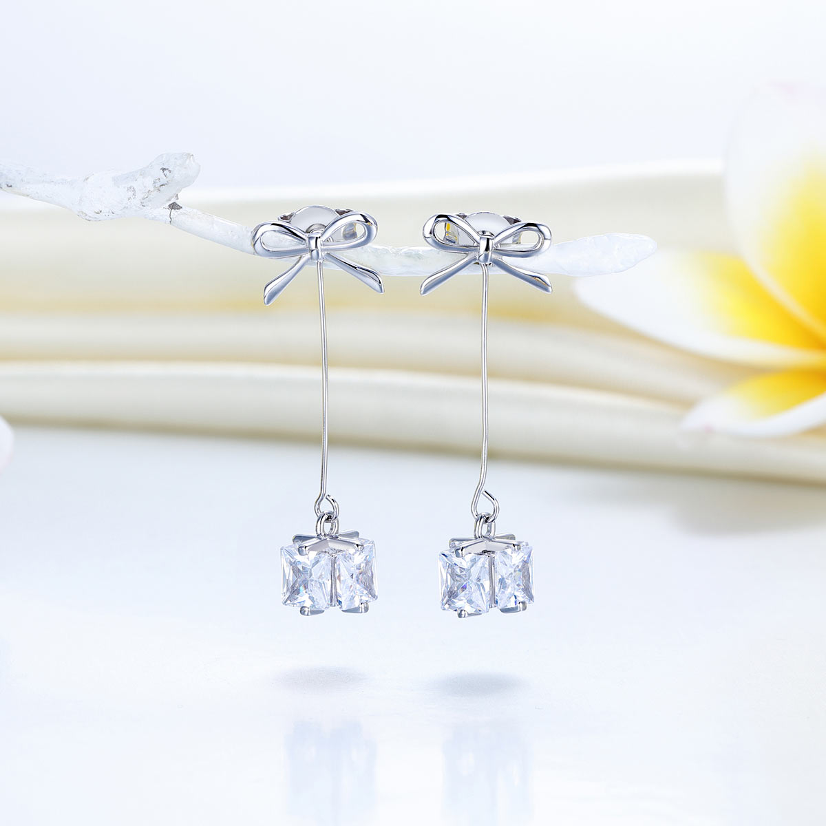 925 Sterling Silver Bowknot Created Diamond Dangle Earrings